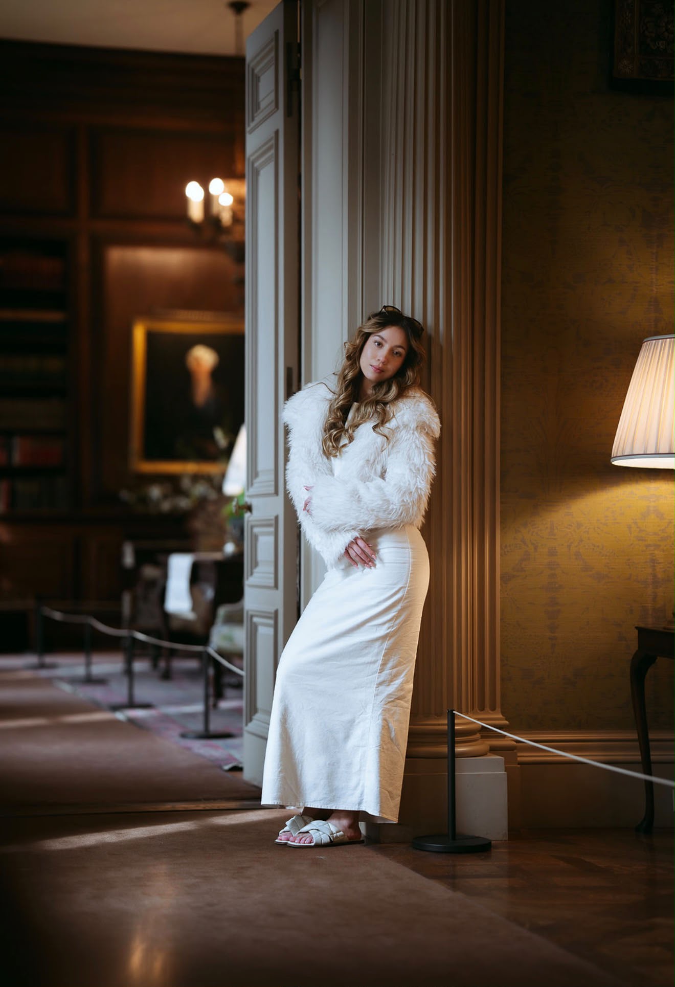 Valeria Henao wearing a white outfit in an elegant interior